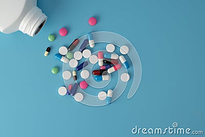 Medicine pills on blue background Copy space for text Assorted pharmaceutical Healthy Eating, Lifestyle Stock Photo
