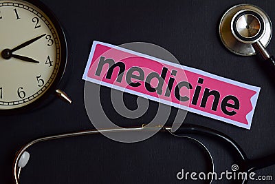 Medicine on the print paper with Healthcare Concept Inspiration. alarm clock, Black stethoscope. Stock Photo