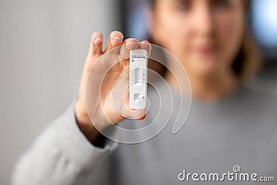 close up of woman holding self coronavirus test Stock Photo