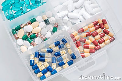 Medicines in a container, various medications for the prevention of viral infections, relieving symptoms, flu and colds Stock Photo