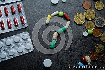 Medicines and money. Expensive medicine. Stock Photo