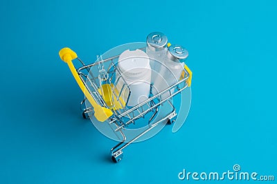 Medicines in a shopping cart for a shopper. The concept of medicine and the cost of treatment Stock Photo