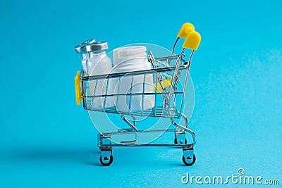 Medicines in a shopping cart for a shopper. The concept of medicine and the cost of treatment Stock Photo