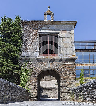 Medieval arched gateway entrance to Portomarin, Camino de Santiago, Spain. Stock Photo