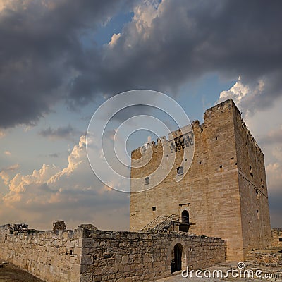 medieval castle tower uplifted on cloudy sky background Stock Photo