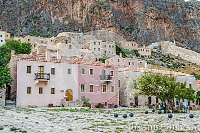 Medieval City of Monemvasia with Amphitheatrical Architecture. Old Castle Town with Multicolored Houses Built on a Huge Rock Editorial Stock Photo