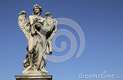 Medieval figure of an angel on the famous bridge Saint Angelo br Stock Photo