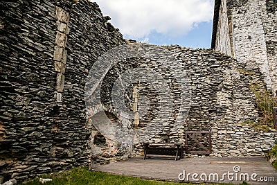 Medieval gothic castle Bezdez, grey stone ruin on hill at sunny day, ancient fortress walls, fairytale stronghold, scalloped walls Stock Photo