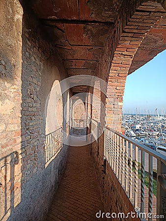 medieval hallway with balcony at the afternoons Stock Photo