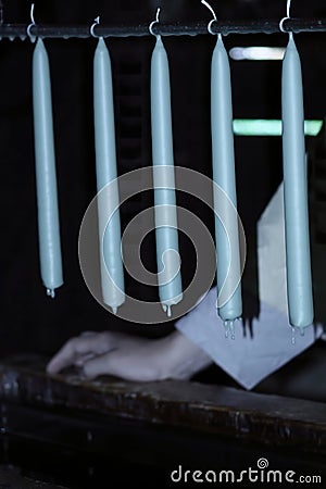 Medieval handmade candle making. Stock Photo