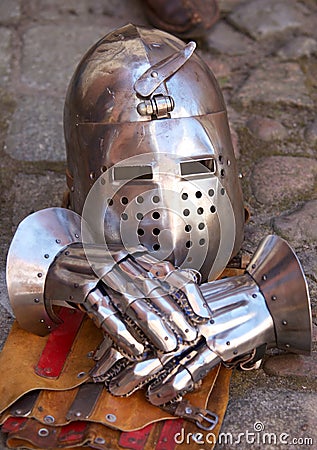 Medieval helmet and gauntlets Stock Photo