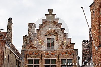 Medieval house with stepped gable in Bruges, Belgium Stock Photo