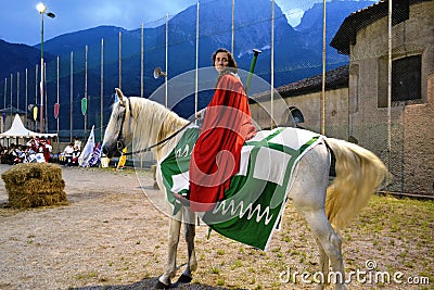 Medieval knight female character ready for competition of rings. Editorial Stock Photo