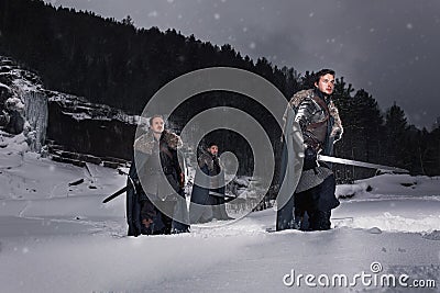 Medieval knight with sword in armor as style Game of Throne Stock Photo