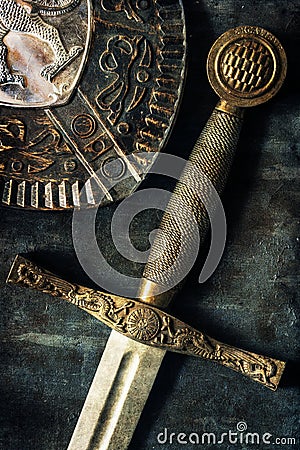 Sword detail over antique background Stock Photo