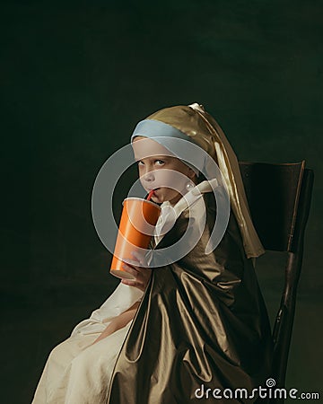 Medieval little girl as a lady with a pearl earring on dark studio background. Concept of comparison of eras, childhood Stock Photo