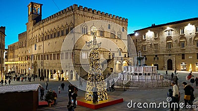 Medieval main square of Perugia with christmas tree at twilight in Umbria Editorial Stock Photo