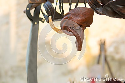Medieval Mask and Objects Hanged in a Stall during a Medieval Ma Stock Photo