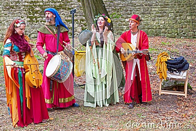 Medieval minstrels playing music Editorial Stock Photo