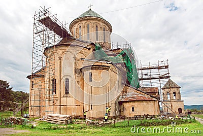 Medieval monastic complex Gelati in scaffolding during renovation, UNESCO World Heritage Site. Editorial Stock Photo