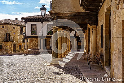 Medieval old town with stone houses, old doors and windows, cobbled streets and picturesque atmosphere. Atienza, Guadalajara, Stock Photo