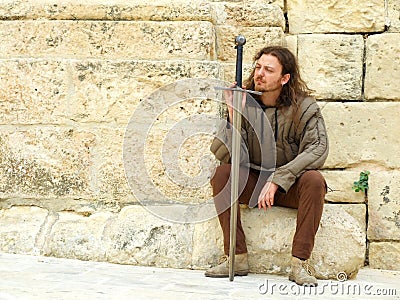 A Medieval Peasant Resting Editorial Stock Photo