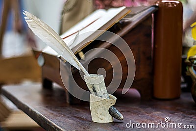 The Ancient Quill: A Timeless Tool of Knowledge Stock Photo