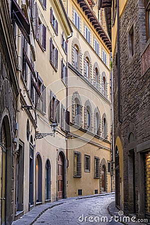 Gothic buildings on a narrow street in Centro Storico of Florence, Italy Stock Photo