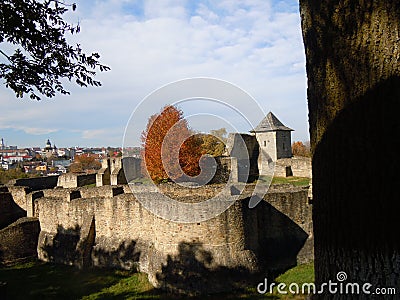 The medieval Seat Fortress of Suceava in autumn sunlight Stock Photo