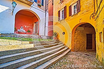The medieval shabby houses on Piazza Paolo Pagani, Castello, Valsolda, Italy Stock Photo