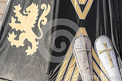 Medieval shields next to war tent Stock Photo