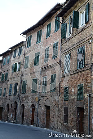 Medieval street Siena Italy Europe Stock Photo