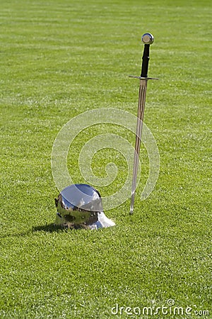 Medieval sword and helmet Stock Photo