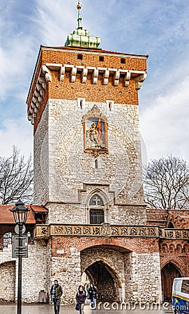 Medieval tower with entrance Gate to Florianska street, Cracow, Poland Editorial Stock Photo