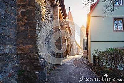 Medieval walls with Schwefelturm (Sulfur Tower) and Faulturm Tower - Rothenburg ob der Tauber, Bavaria, Germany Stock Photo