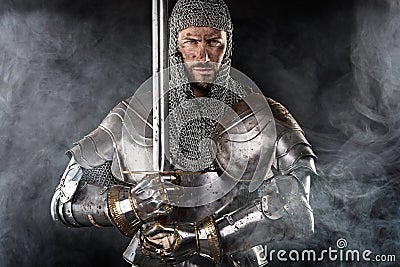 Medieval Warrior with Chain Mail Armour and Sword Stock Photo