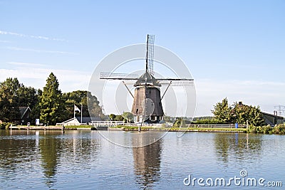 Medieval windmill in the countryside from Netherlands Stock Photo