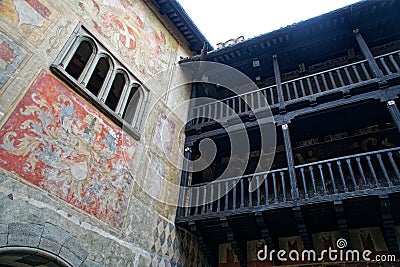 Medieval wooden gallery of the second floor in an old stone castle Editorial Stock Photo