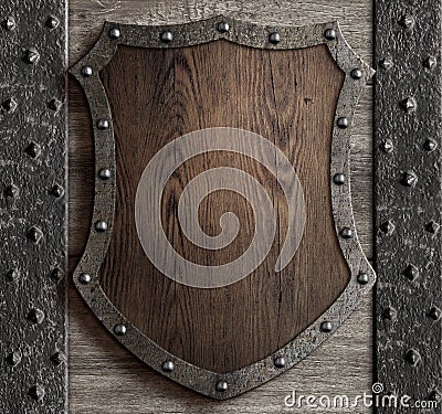 Medieval wooden shield on castle gate 3d illustration Stock Photo