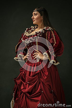 Medieval young woman in old-fashioned costume Stock Photo