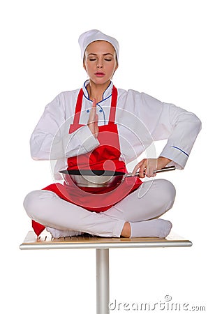The meditator cook with frying pan Stock Photo
