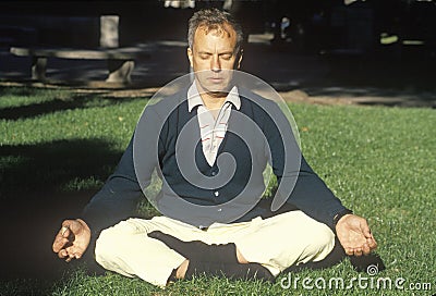 A meditator in sun light in Philadelphia Pennsylvania Editorial Stock Photo