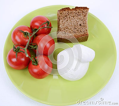 Mediterranean diet tomato, mozzarella and brown bread Stock Photo