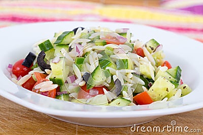 Mediterranean greek orzo pasta salad Stock Photo