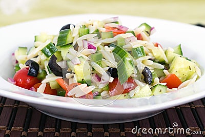 Mediterranean greek orzo pasta salad Stock Photo