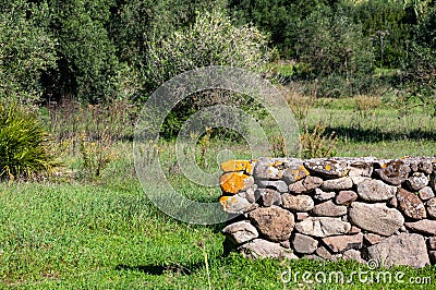 Sardinia. Rural architecture. Typical dry stone wall for fencing of rural properties. The walls characterize the island landscape Stock Photo