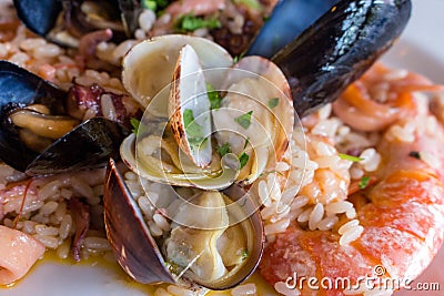 Mediterranean seafood dish. Risotto meal. Italian delicious cuisine. Stock Photo