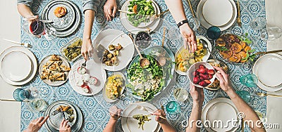 Mediterranean style dinner with various snacks and drinks, wide composition Stock Photo