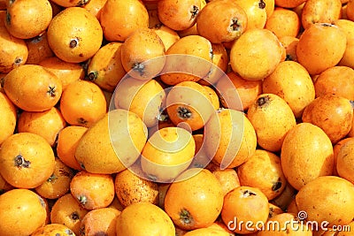 Medlar fruits pattern background texture market Stock Photo