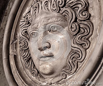 Medusa face sculpture. Head portrait of MedusaIn Greek mythology Medusa was a monster, a Gorgon, a winged human female Stock Photo